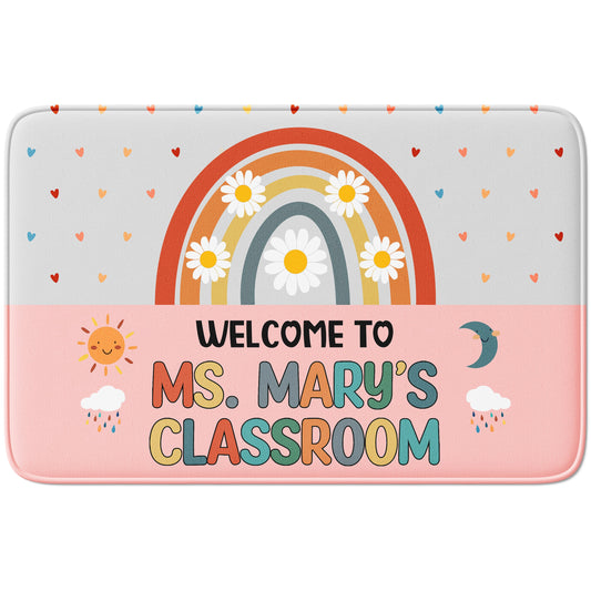 Personalized classroom mat with rainbow, flowers, and text on a white background